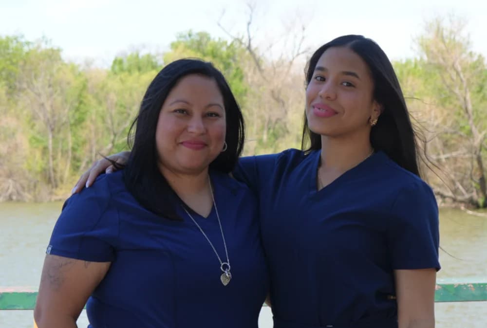 Rosamaria and Vanessa welcoming new patients